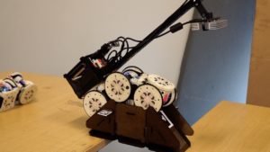 Simple Robots Perform Complex Tasks With Environmental Modifications